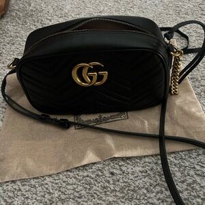 Gucci Black Crossbody Bag with Gold Accents